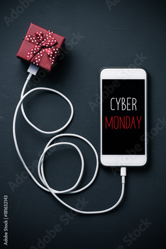 gift and text happy cyber monday in a smartphone