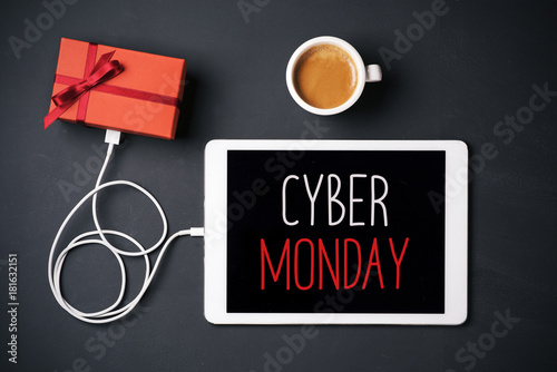 gift and text happy cyber monday in a tablet