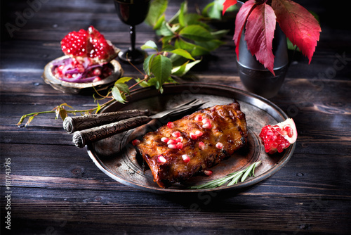 Obraz na płótnie Fried pork ribs with wine and rosemary