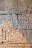 ruined bas relief ancient hieroglyphs on stone detail