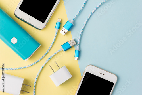 USB charging cables for smartphone and tablet in top view © fosupaksorn