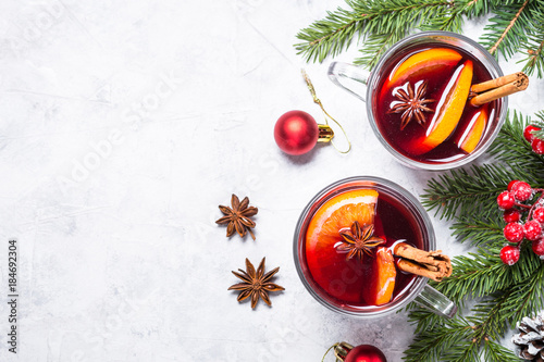 Mulled wine in glass top view copy space.