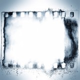 Blue and white grunge film strip frame on dripping background.