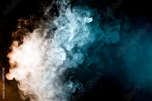 Dense Multicolored Smoke Of Red Blue On A Black Isolated Background