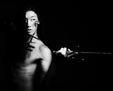 asian boy with weapons