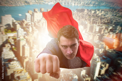 Flying super hero over the city