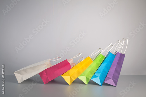 some colorful paper present bag