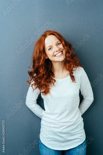 Happy friendly young woman with a lovely smile © contrastwerkstatt