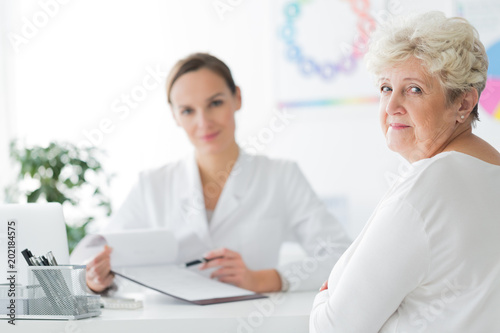 Smiling dietician's patient