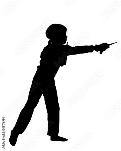 silhouette of young male fighter exercising with kunai © Denys Kurbatov