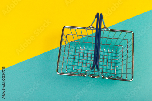 shopping basket on a colored background © fotofabrika