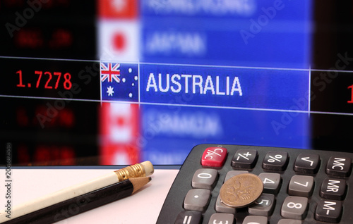 Five Cents Coin Of Australia On The Calculator With Pencils On The White Floor And Digital Five Cents Coin Of Australia On The Calculator With Pencils On The White Floor And Digital