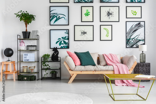 Gold Metal Table Standing In White Living Room Interior With Decor Gold Metal Table Standing In White Living Room Interior With Decor On Black Racks Fresh Green