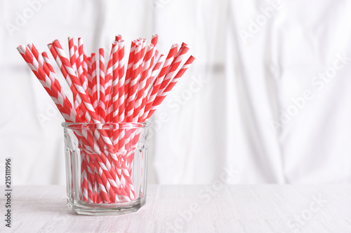 Recyclable Red Drinking Straws in a glass © stevecuk