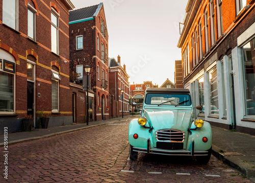 a-stylish-retro-car-in-blue-on-the-street-in-the-dutch-city-of-vlaardingen-rotterdam-holland-the-netherlands