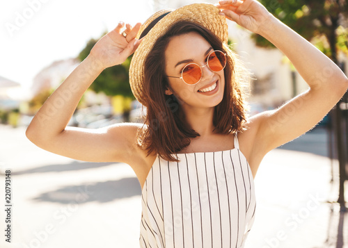 Portrait Of Beautiful Cute Blond Teenager Model In Summer Hipster Clothes Posing On The Street Background Portrait Of Beautiful Cute Blond Teenager Model In Summer Hipster Clothes Posing On The Street Background