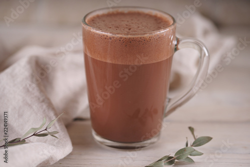 Glass mug with cocoa