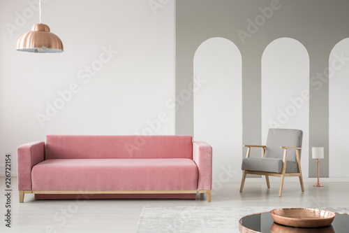 Real Photo Of A Creative Living Room Interior Decorated With Arches Real Photo Of A Creative Living Room Interior Decorated With Arches Pink Sofa And Retro