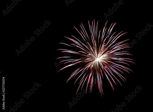 Fireworks , sparklers ,bursting against a black background