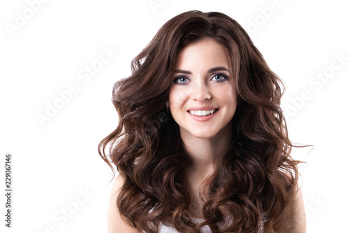 Beautiful young woman with curly hair isolated. © BestForYou