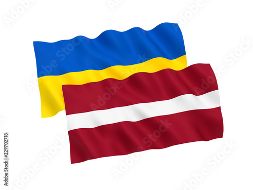 Flags of Ukraine and Latvia on a white background © epic