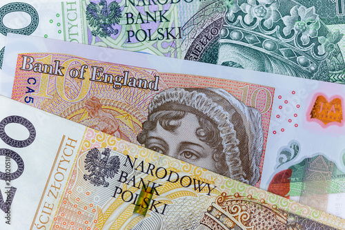Close Up Macro Photography Of British Pound And Polish Zloty Close Up Macro Photography Of British Pound And Polish Zloty Business Money Exchange Concept