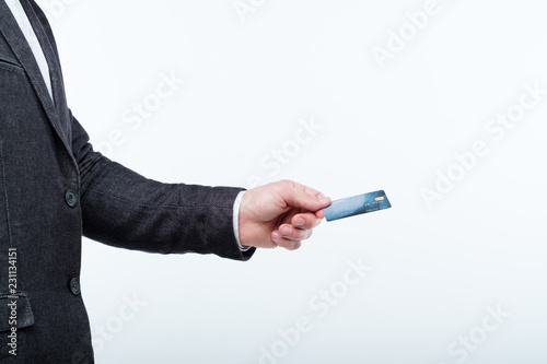 credit card online operations and banking. money transaction. man holding plastic card. © golubovy