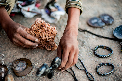 Boy boy selling handmade jewelry near Merzouga, Morocco © szymon