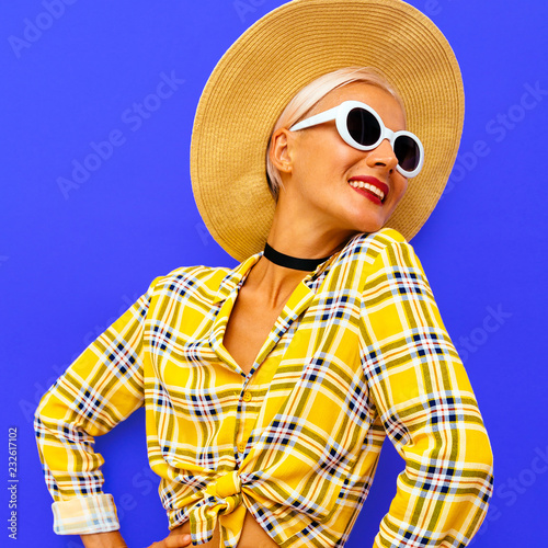 Smile Model country Beach style. Fashion accessories hat and sunglasses. Checkered shirt trends © Porechenskaya