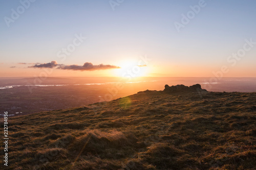 The sun rises over the River Severn for the first time in 2013, as seen from the hills above Great Malvern, Worcestershire, UK on Tuesday, 1 January, 2013. © David