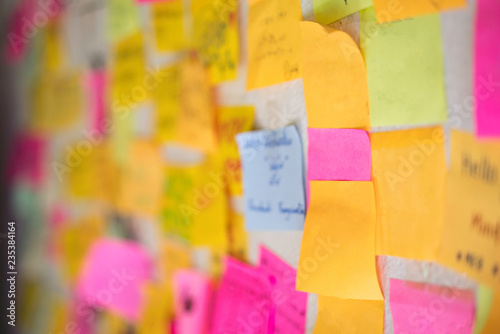 Image of colorful sticky notes on cork bulletin board