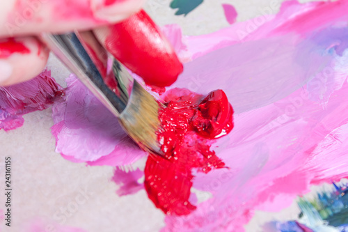 The Artist Squeezed Paint Onto Palette And Mi Pink The Artist Squeezed Paint Onto Palette And Mi Pink With A Synthetic