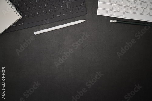 Office dark leather desk creative supplies workspace and copy space © bongkarn