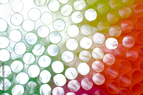 Colorful Plastic straws Holes with Light. © Mats Silvan