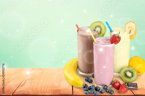 Fruit Smoothies with Straws Isolated on a White Background © BillionPhotos.com