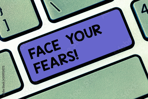 Handwriting text Face Your Fears. Concept meaning Have the courage to overcome anxiety be brave fearless Keyboard key Intention to create computer message pressing keypad idea