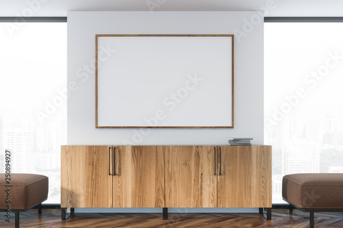 Living room with wooden cabinet and poster © denisismagilov