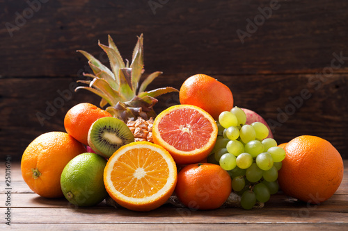 fresh fruits on wooden table © Nitr