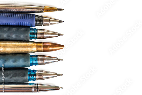 Bullet and pens on white background. Freedom of the press is at risk concept. World press freedom day concept