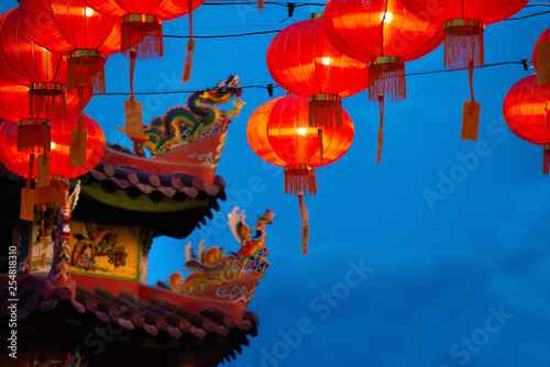chinese new year lantern with dragon background with copyspace © wong yu liang