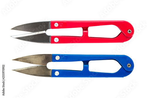 Two thread trimming scissors isolated on white background. Scissors yarn thread cutter snips trimming nipper tool isolated © phanasitti