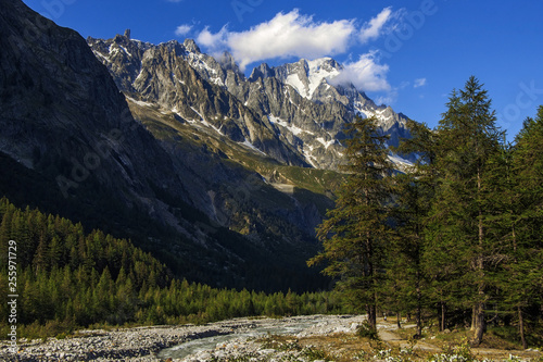 Valley, stones and river in the mountains near Mont Blanc © Yurii
