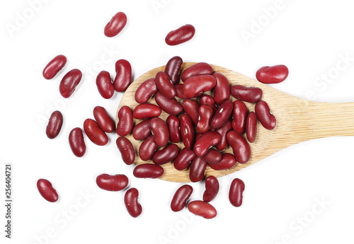 Raw red beans with wooden spoon isolated on white background © dule964