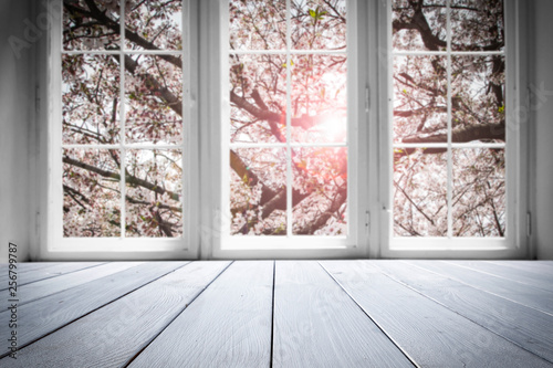 Desk of free space and spring window background © magdal3na