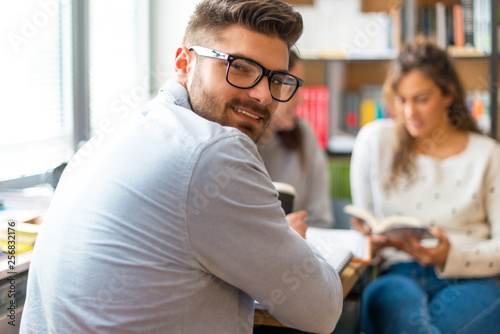 Male student in library