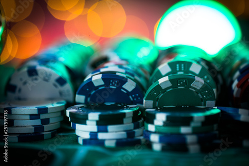 Casino theme. High contrast image of casino roulette, and poker chips © Aerial Mike