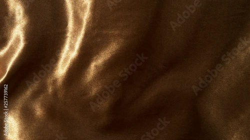 Super slow motion of waving gold velvet cloth in detail. Filmed on high speed cinema camera, 1000fps. © Jag_cz