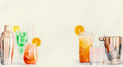 Summer long drinks and cocktails background with various beverages and bar tools. Banner . Copy space. Frame © VICUSCHKA
