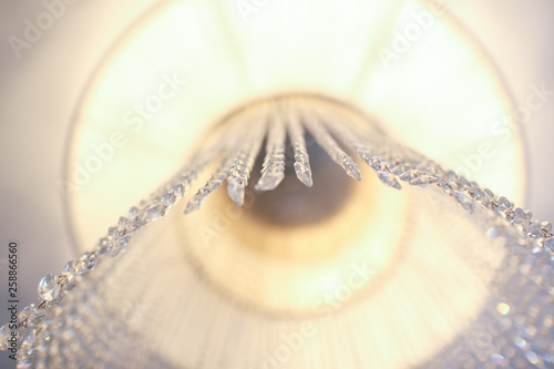 Hanging crystals in a chandelier © hreniuca