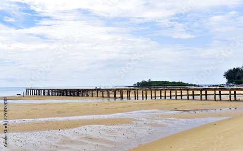 The long pier at Burung Mandi Beach, eastern side of Belitung Island, Indonesia © akturer